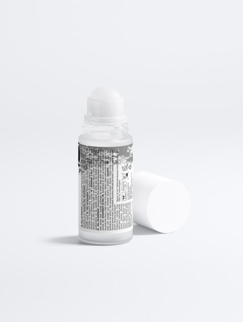 Anointed Garments aluminum-free roll-on deodorant in a white bottle with soothing aloe vera and panthenol formula