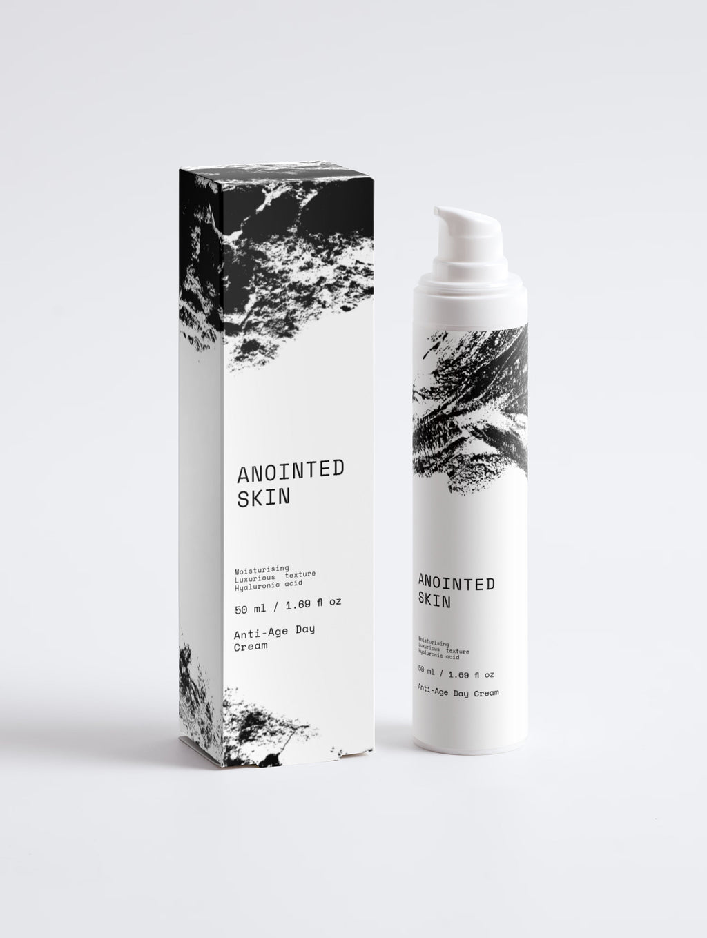 Anointed Garments Anointed Skin Anti-Age Day Cream bottle and box with white packaging and black abstract brushstroke art.