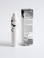 Anointed Garments Anti-Age Day Cream bottle and its black and white packaging box on a clean white background.