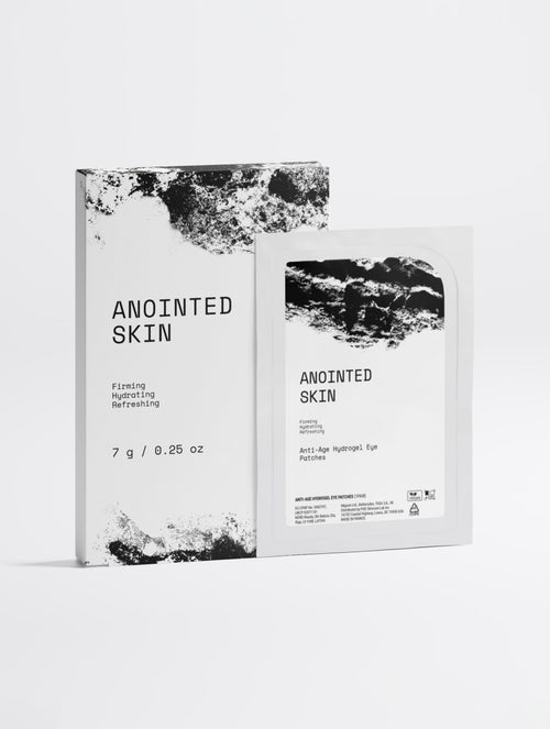 Anointed Garments ANOINTED SKIN anti-age hydrogel eye patches in white packaging with black artistic design