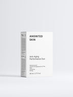 Anointed Garments Anointed Skin Anti-Aging Performance Duo box featuring peptide serum and day cream for smooth skin.