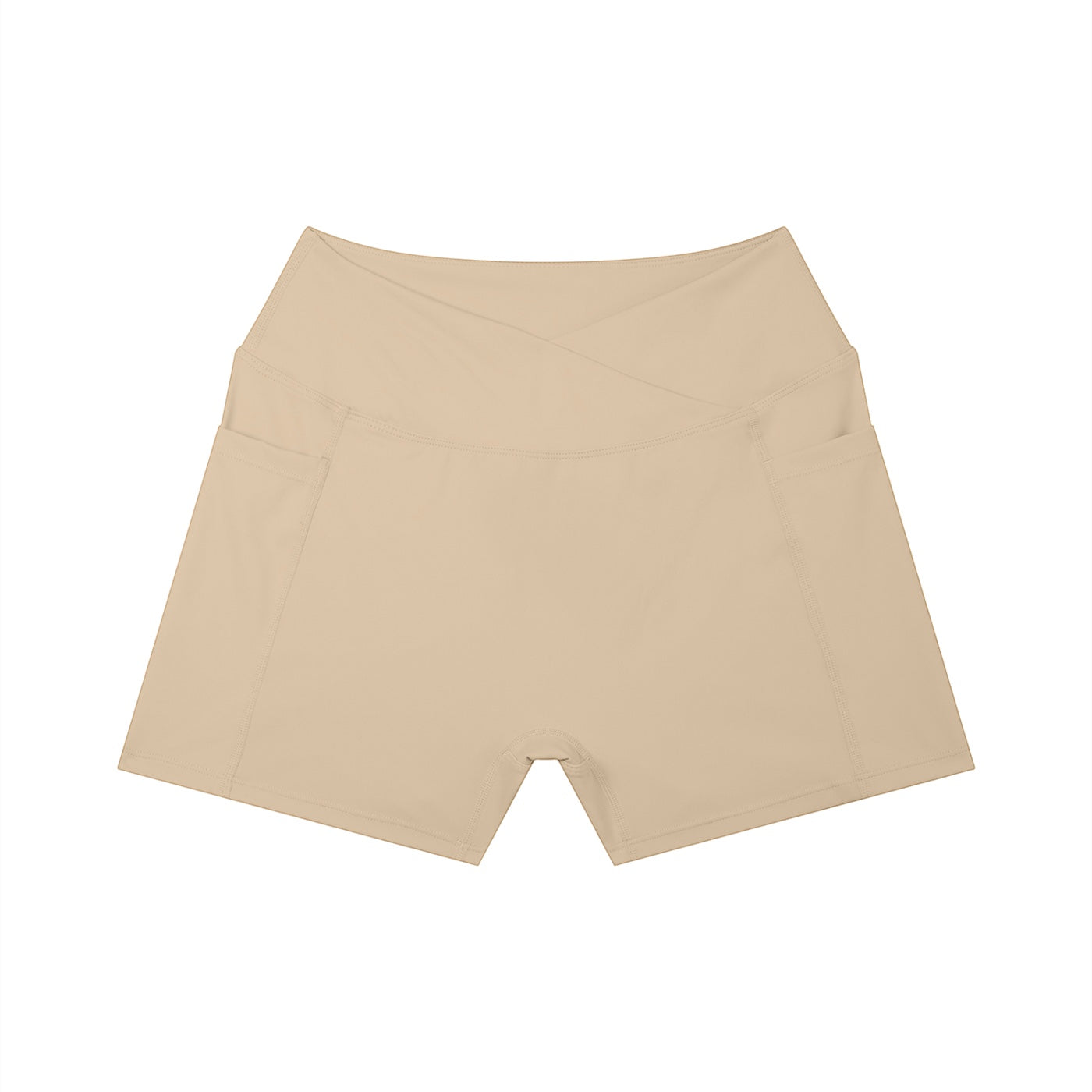 Anointed Garments beige high-waisted athletic shorts with a crossover waistband and side pockets for workouts.