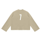 Anointed Garments beige cropped crewneck sweatshirt featuring a white number 7 graphic on the back