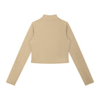 Anointed Garments beige cropped long sleeve mock neck zip up jacket with structured bodice detail