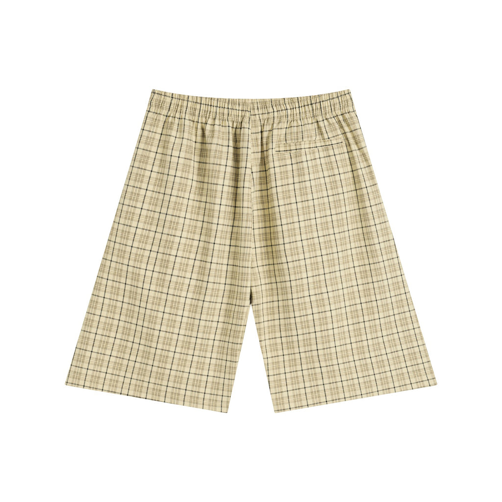 Anointed Garments beige plaid cotton blend shorts with an elastic waistband and back pocket, back view.