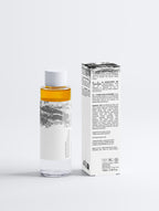 Anointed Garments bi-phasic makeup remover bottle with white cap and product box featuring botanical ingredient list.