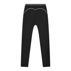 Anointed Garments black high-waisted athletic leggings with white contrast piping details for a flattering fit.
