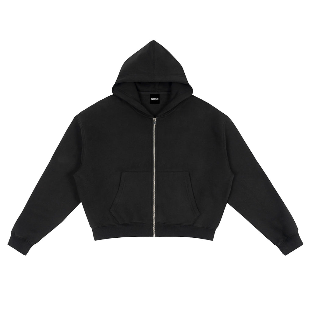Anointed Garments black fleece zip-up hoodie with a boxy, oversized fit, drop shoulders, and front pockets.