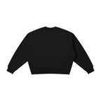 Back view of a black Anointed Garments Essential crewneck sweatshirt with a relaxed fit and ribbed cuffs and hem.