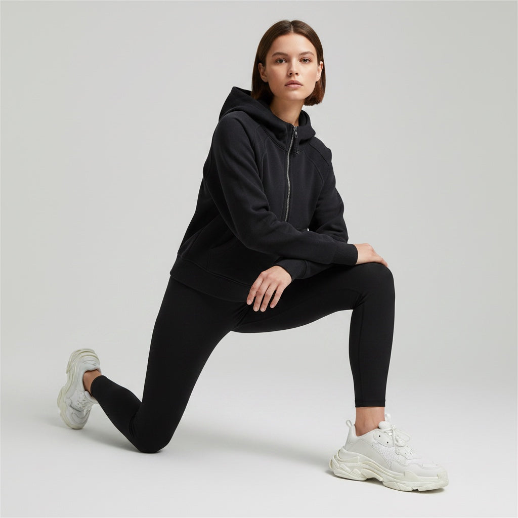 Model wearing Anointed Garments black half-zip cropped pullover hoodie with raglan sleeves and kangaroo pocket