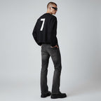 Model wearing Anointed Garments black cropped crewneck sweatshirt with white number 7 graphic on the back