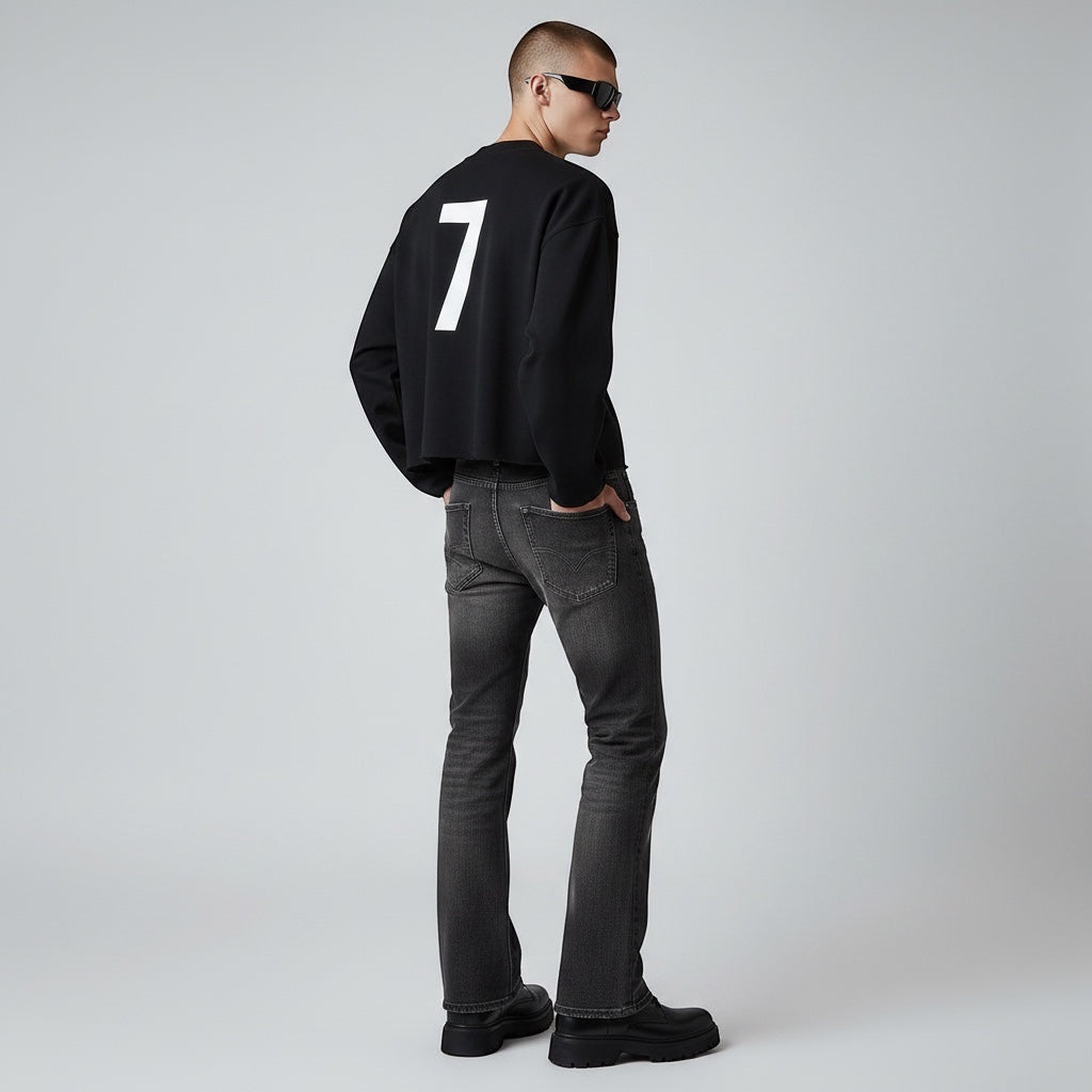 Model wearing Anointed Garments black cropped crewneck sweatshirt with white number 7 graphic on the back