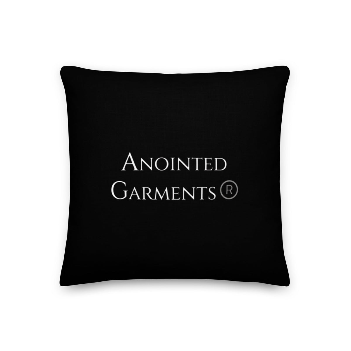 Anointed Garments black decorative pillow with linen-feel texture and centered white brand logo