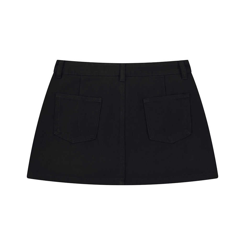Back view of Anointed Garments black denim mini skirt featuring two patch pockets and a clean A-line silhouette.