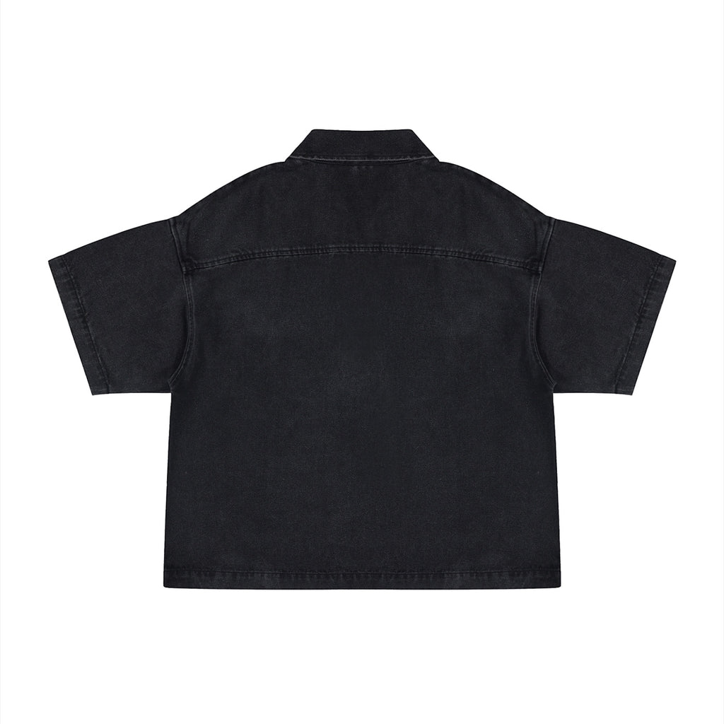 Back view of Anointed Garments short sleeve black denim shirt with a relaxed boxy fit and classic collar.