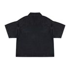 Back view of Anointed Garments short sleeve black denim shirt with a relaxed boxy fit and classic collar.