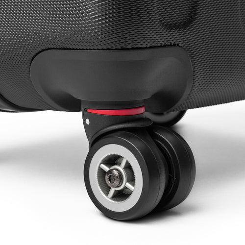 Anointed Garments black hardshell suitcase featuring a durable 360-degree multi-directional spinner wheel
