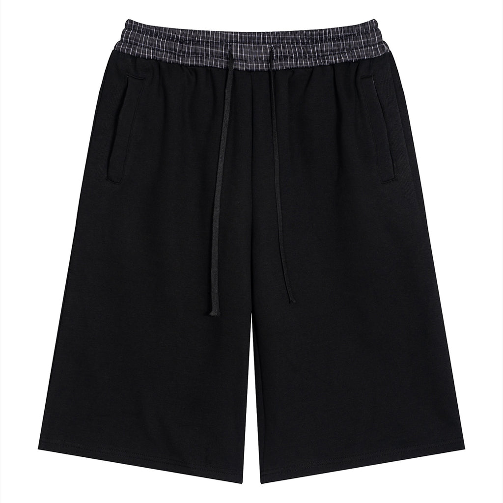 Anointed Garments unisex black casual shorts with a plaid elastic waistband, drawstring, and side pockets.