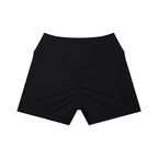 Anointed Garments black high-waisted athletic shorts with a ruched back, side pockets, and moisture-wicking fabric.