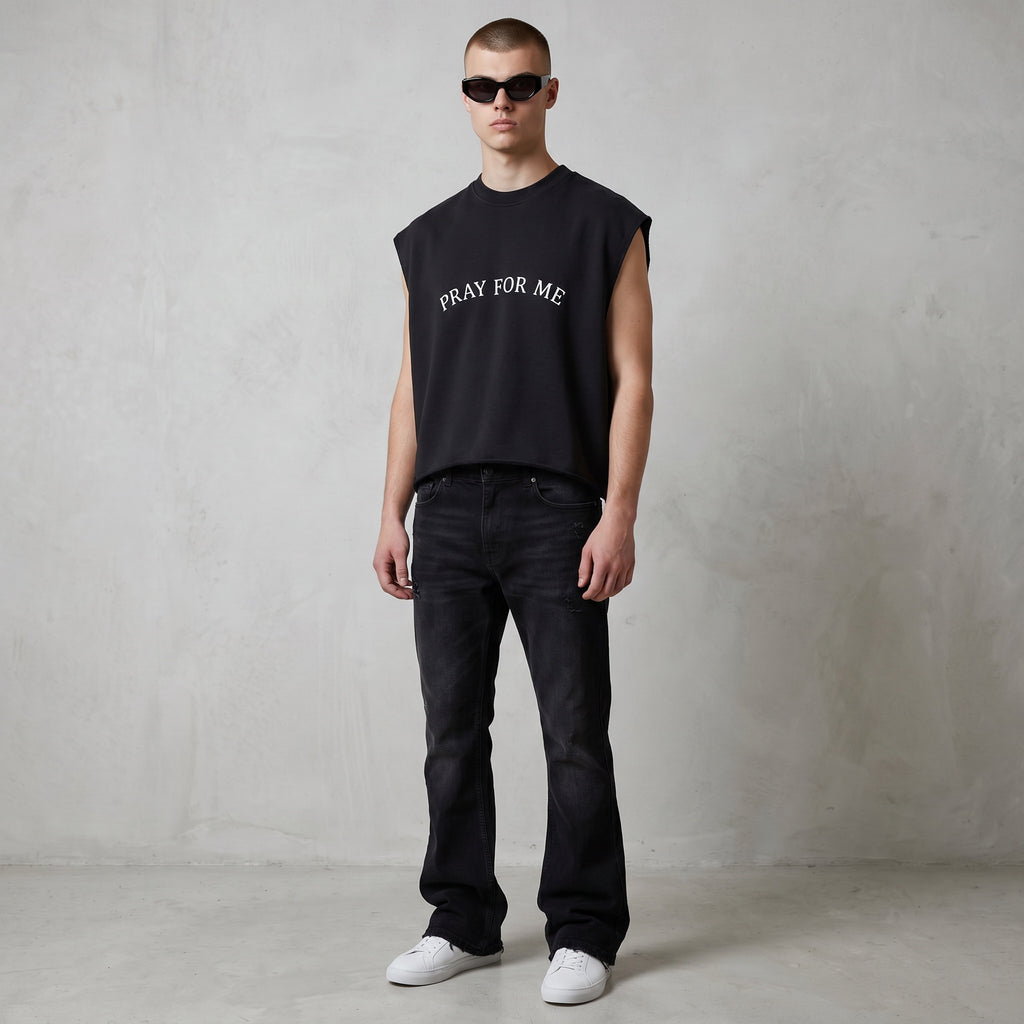 Anointed Garments black sleeveless crop top with Pray For Me text, worn by a model with sunglasses and black jeans.