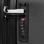 Anointed Garments black hard shell suitcase featuring a secure TSA-approved combination lock and metal zipper pulls.