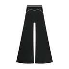 Anointed Garments high-waisted black wide-leg trousers featuring elegant white contrast piping detail.