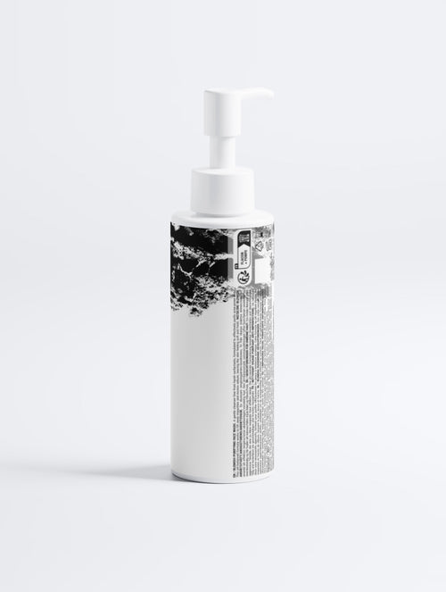 Anointed Garments blemish purifying face wash in a white pump bottle with black graphic design on a clean background.