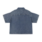 Back view of Anointed Garments short sleeve denim shirt in blue with a relaxed, boxy fit and classic collar.