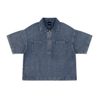 Anointed Garments short sleeve denim shirt in blue with a quarter-zip closure, collar, and two chest pockets.