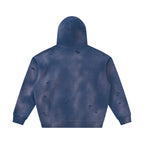 Back view of an Anointed Garments blue distressed pullover hoodie with a vintage washed finish and raw edge details.