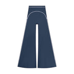 Anointed Garments high rise flared yoga pants in dark blue with white piping detail, made from stretchy polyamide blend.
