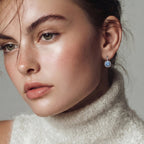 Anointed Garments Celestial Halo Drops featuring blue moissanite in a platinum-plated sterling silver cushion setting.
