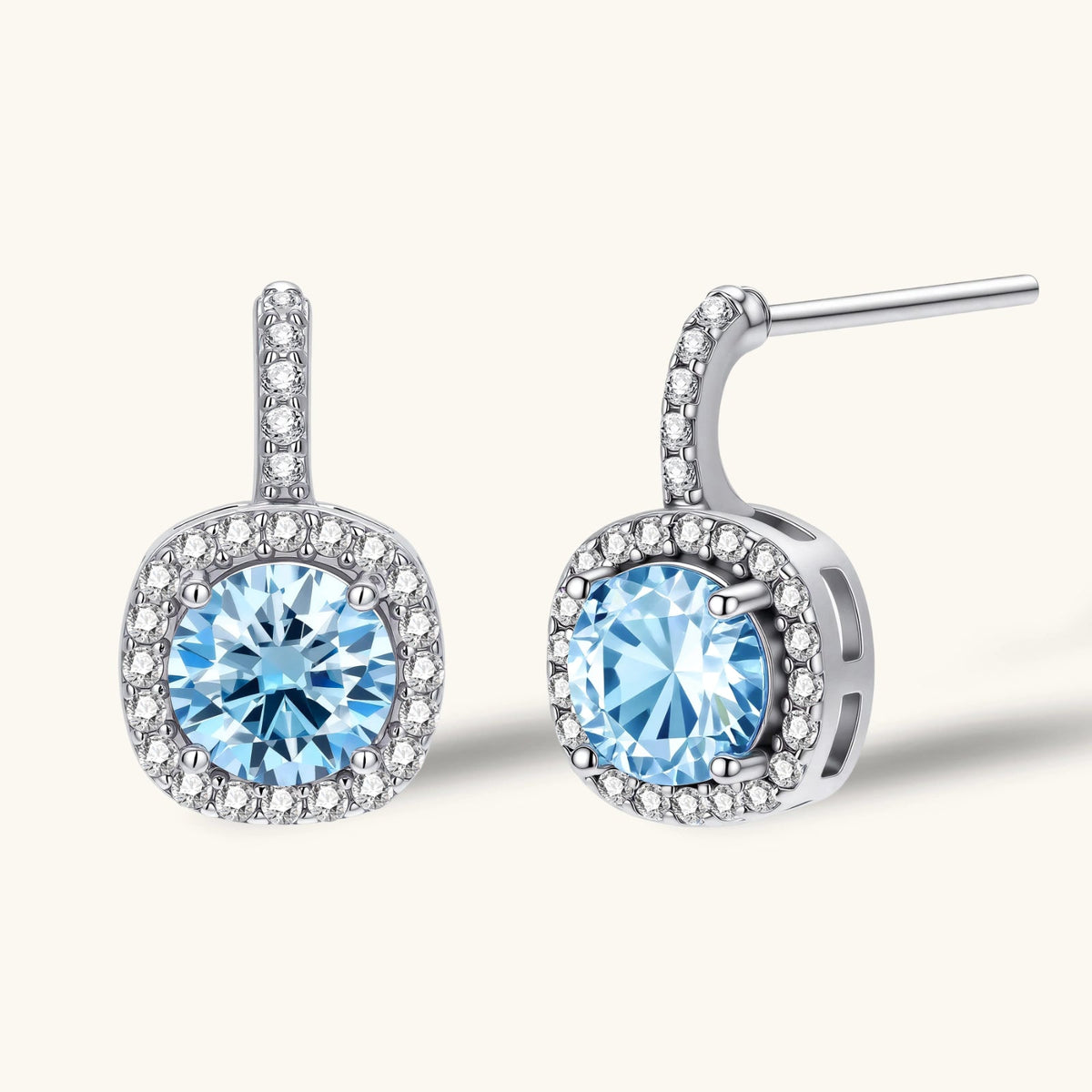 Anointed Garments Celestial Halo drop earrings featuring round blue moissanite stones in platinum-plated silver settings