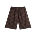 Anointed Garments unisex brown plaid casual shorts with an elastic waistband and back pocket, back view.
