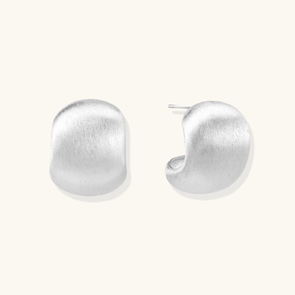 Anointed Garments brushed sterling silver stud earrings with a sculptural geometric silhouette and matte finish.