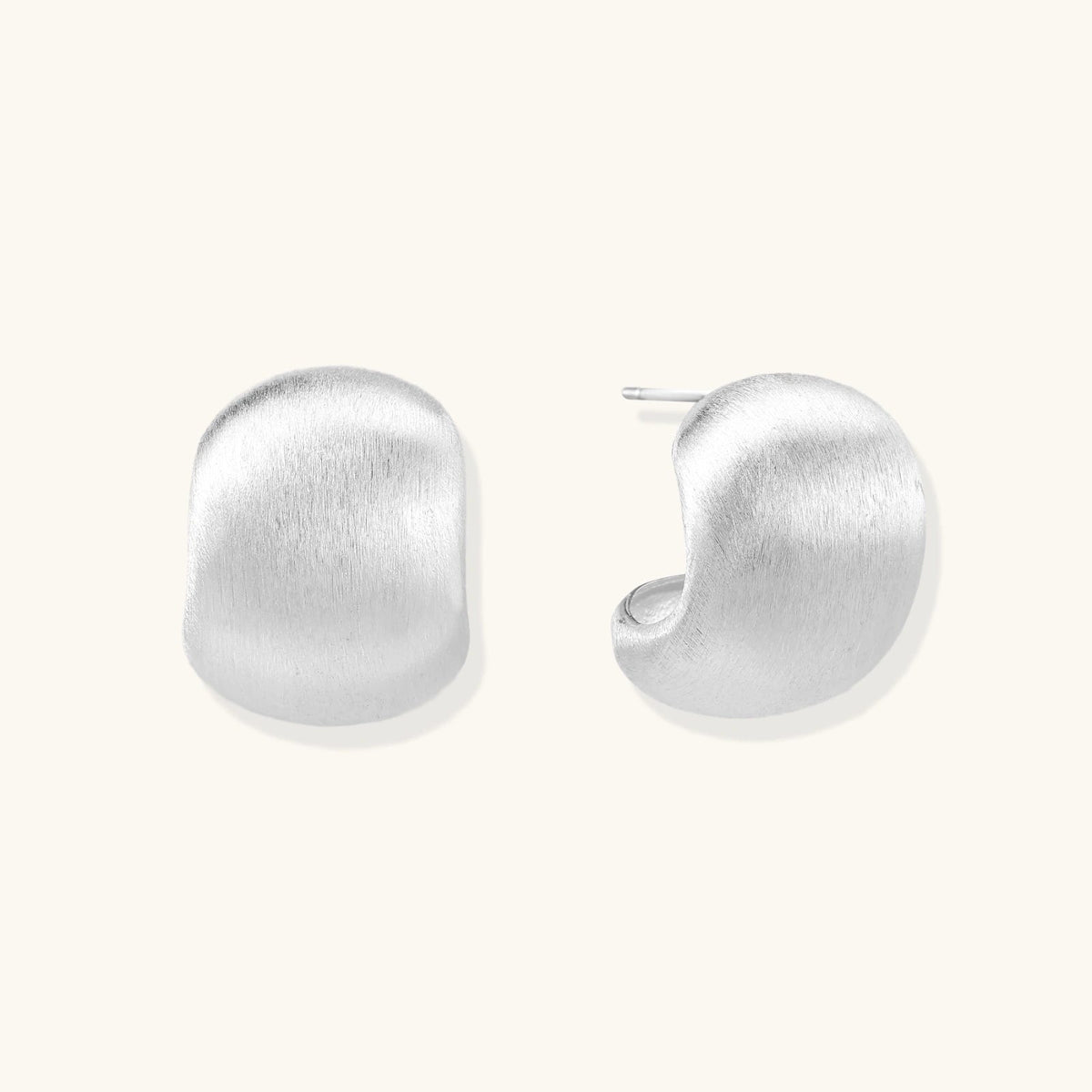 Anointed Garments brushed sterling silver stud earrings with a sculptural geometric silhouette and matte finish.