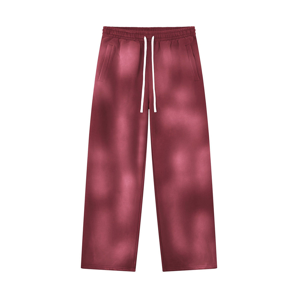 Anointed Garments unisex wide leg fleece sweatpants in a washed burgundy sunfade finish with an elastic drawstring waist.