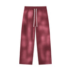 Anointed Garments unisex wide leg fleece sweatpants in a washed burgundy sunfade finish with an elastic drawstring waist.
