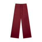 Anointed Garments burgundy high rise straight leg yoga pants with a drawstring waist and side pockets.