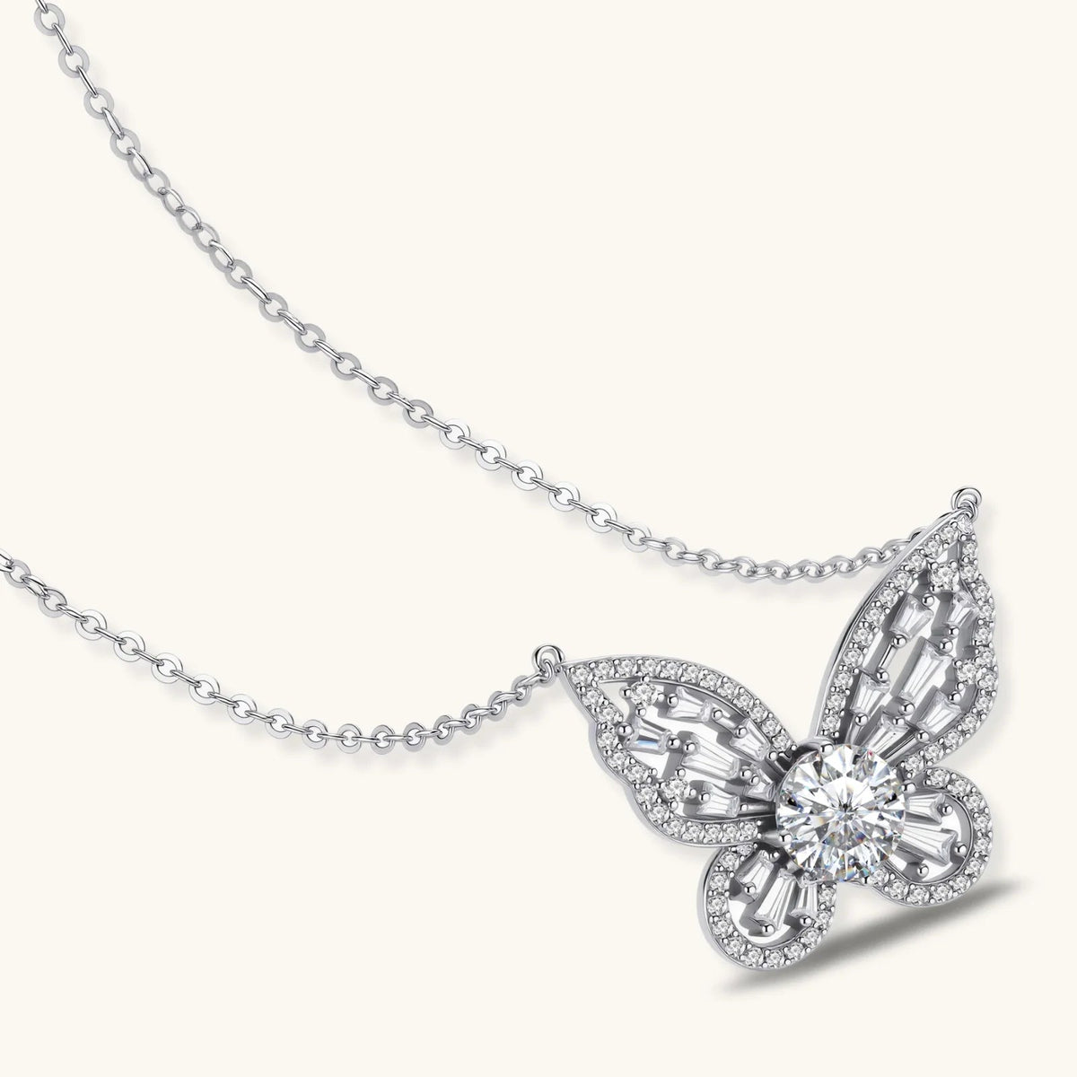 Anointed Garments butterfly pendant necklace in platinum-plated sterling silver with a 1-carat round moissanite center.