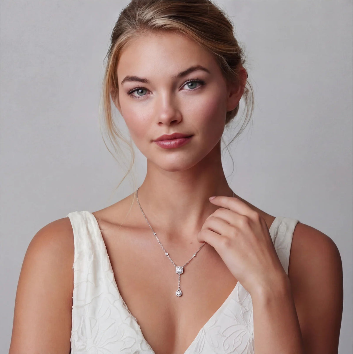 Anointed Garments Celestial Balance Necklace featuring a platinum-plated sterling silver chain with moissanite stones.