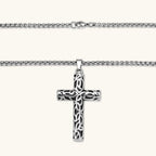 Anointed Garments Celtic Cross necklace featuring an oxidized stainless steel filigree pendant with intricate knotwork.