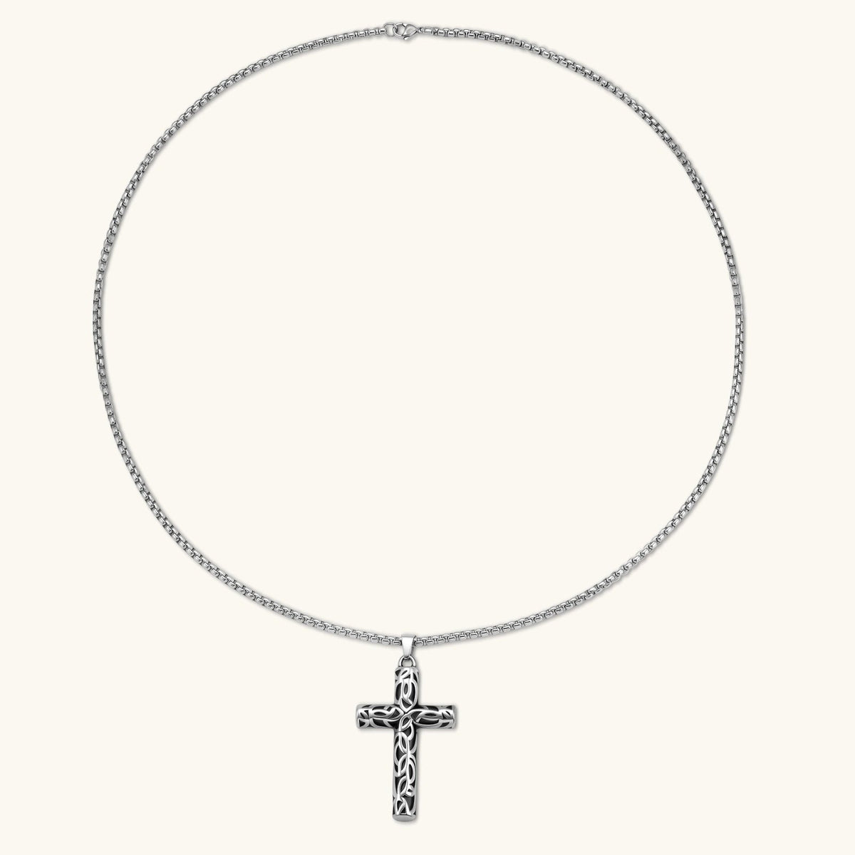 Anointed Garments Celtic cross necklace featuring an oxidized stainless steel filigree pendant on a 60cm chain.