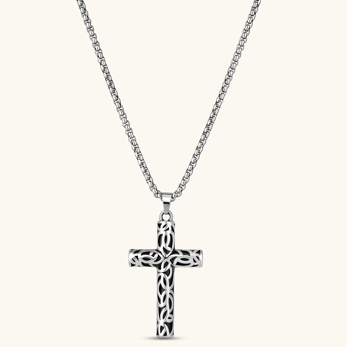 Anointed Garments Celtic cross necklace featuring an oxidized stainless steel filigree pendant on a silver chain.