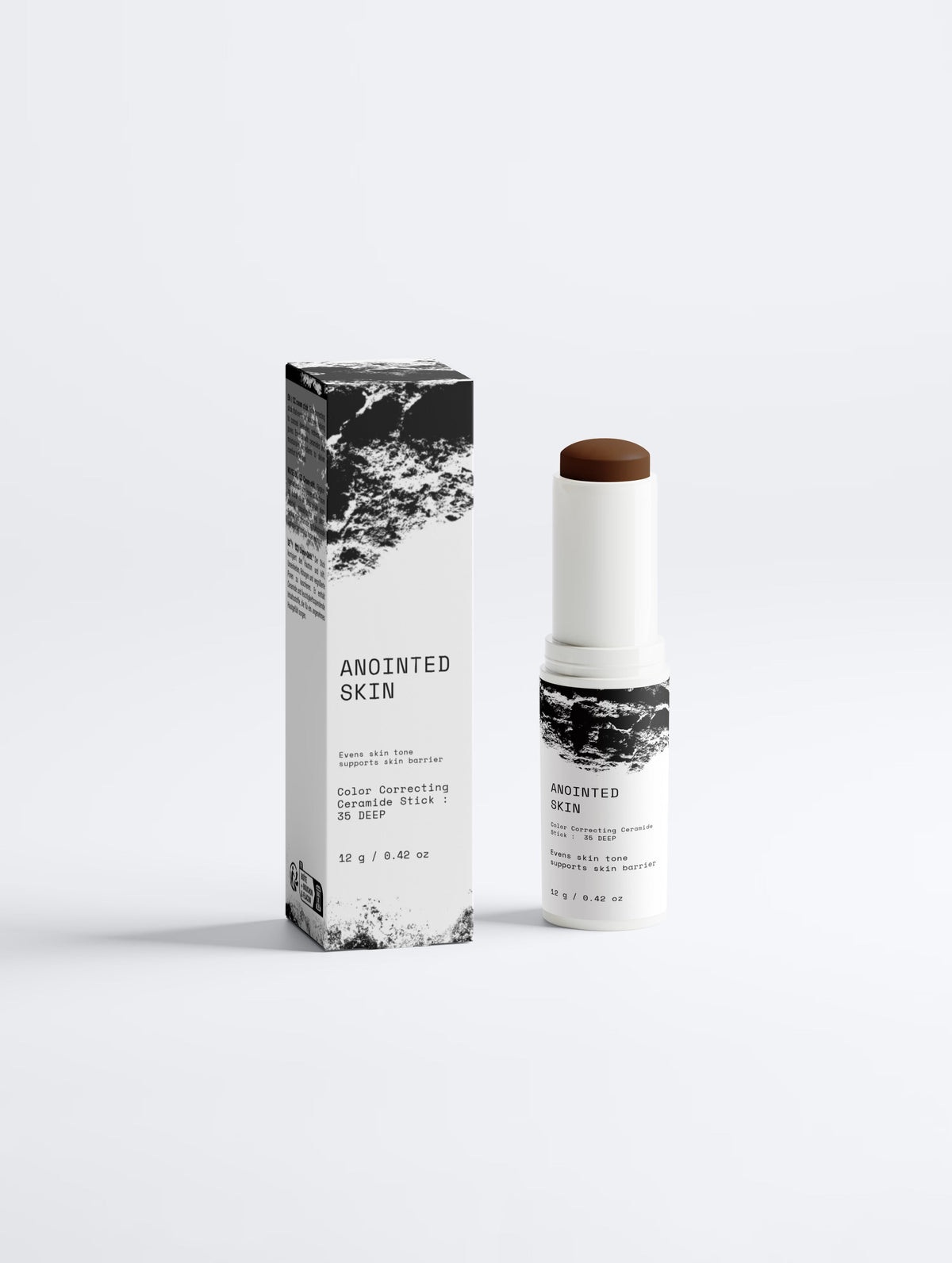 Anointed Garments Anointed Skin color-correcting ceramide stick in shade 35 Deep with its matching monochrome box.