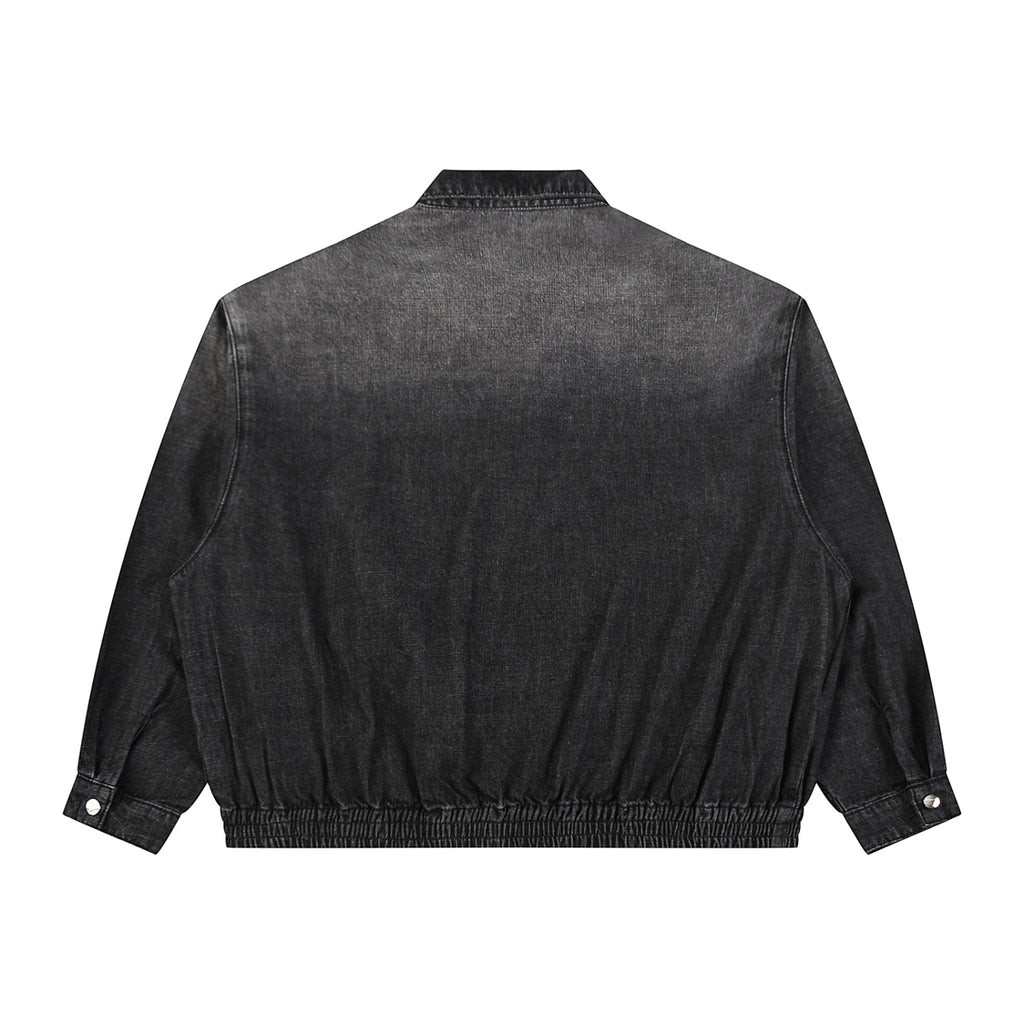 Back view of Anointed Garments charcoal acid-wash denim bomber jacket with elasticated hem and cuffs.