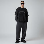 Anointed Garments Pray For Me graphic t-shirt in charcoal mineral-wash cotton with a relaxed fit worn by a male model.