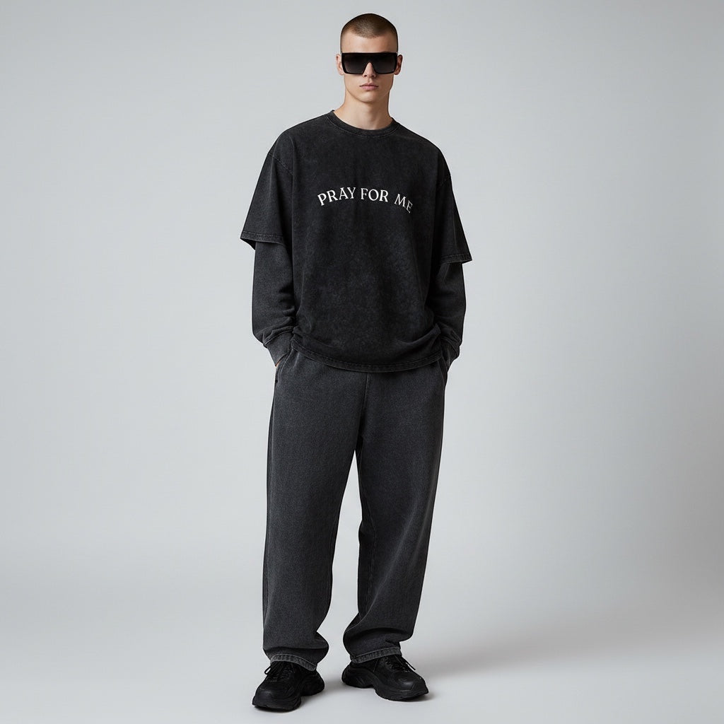 Anointed Garments Pray For Me graphic t-shirt in charcoal mineral-wash cotton with a relaxed fit worn by a male model.