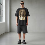 Anointed Garments charcoal black cotton graphic t-shirt with raglan sleeves and vintage wash worn by a male model.