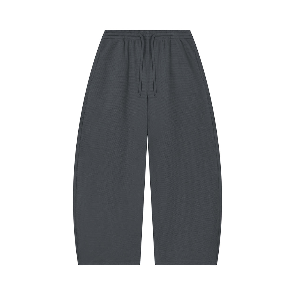 Anointed Garments unisex charcoal grey waffle knit barrel leg pants with a drawstring waist and loose fit.